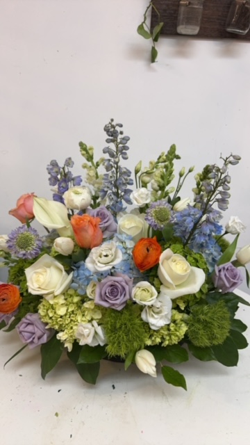 White, orange, and purple roses