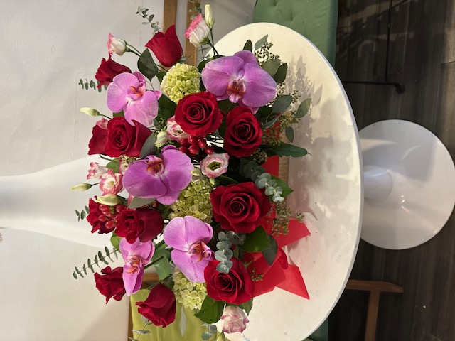 Red roses and pink flowers
