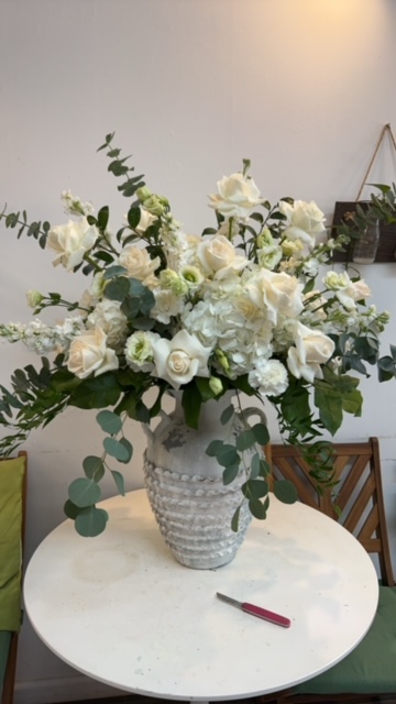 Arrangement with white roses