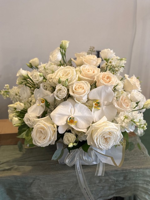 All white roses arrangement