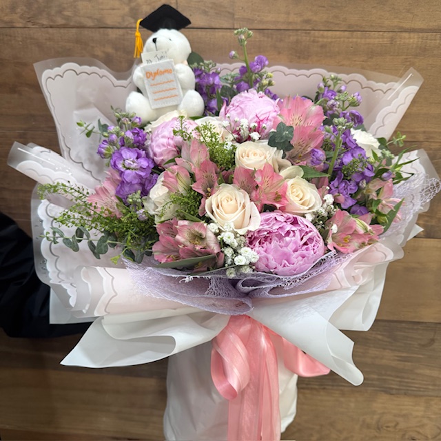 Graduation bouquet with mixed flowers
