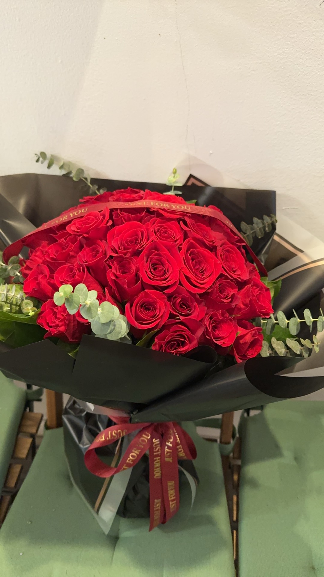 Black bouquet with red roses