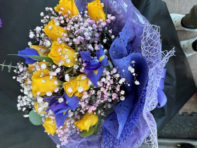 Blue bouquet with yellow and blue flowers